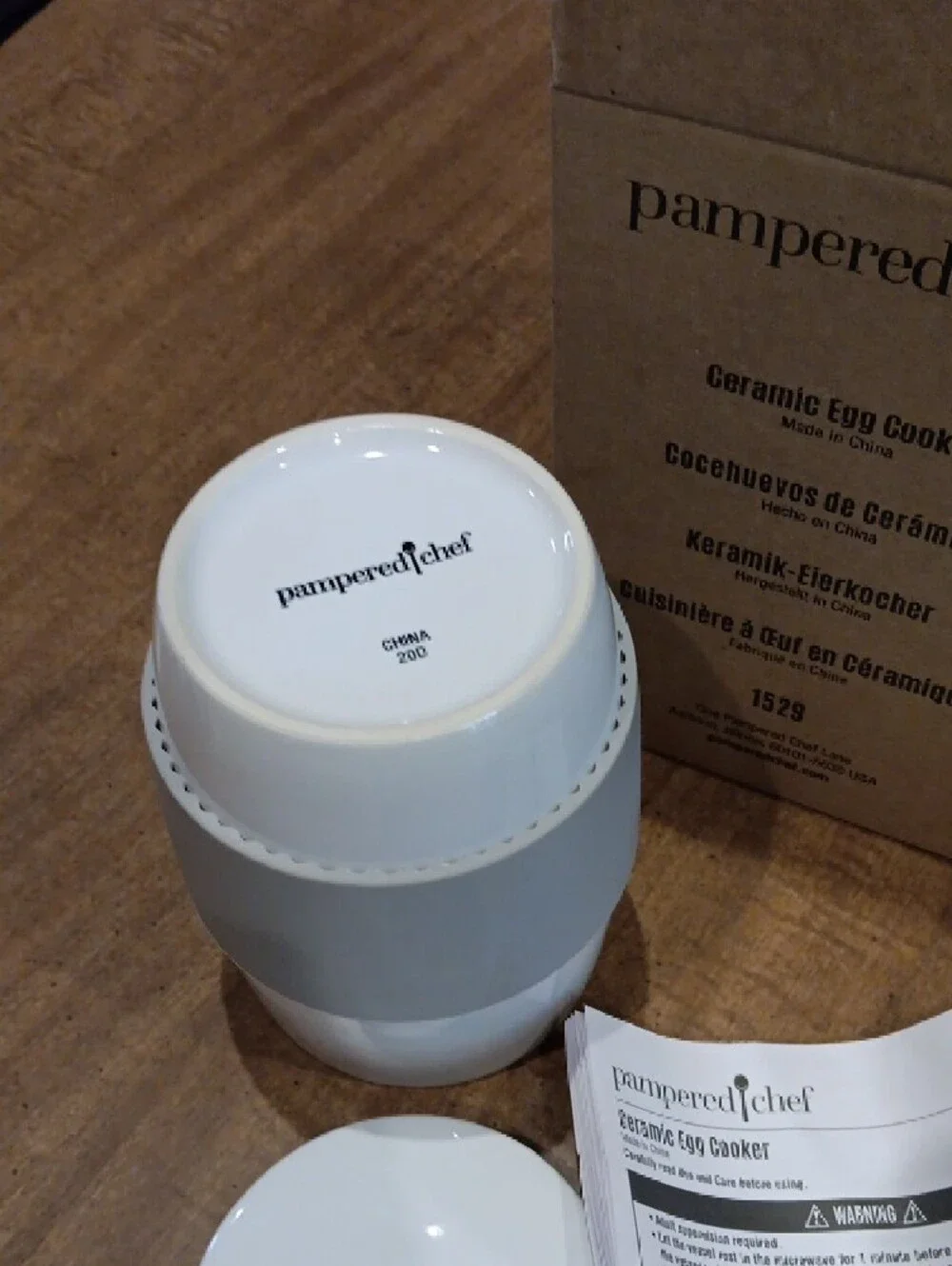 Pampered Chef White Ceramic Egg Cooker with Gray Silicone Grip